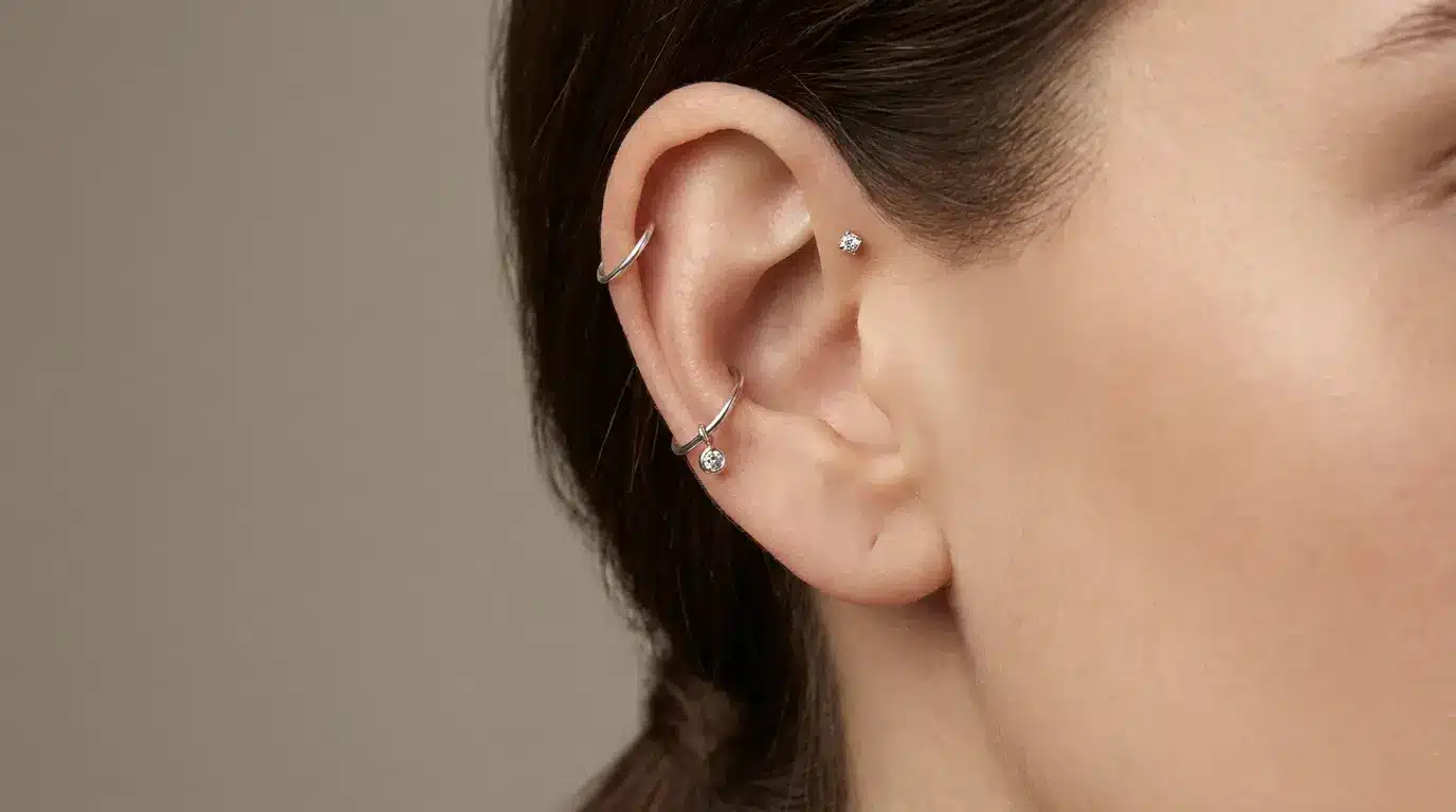 Cartilage-focused ear stack with helix and conch piercings