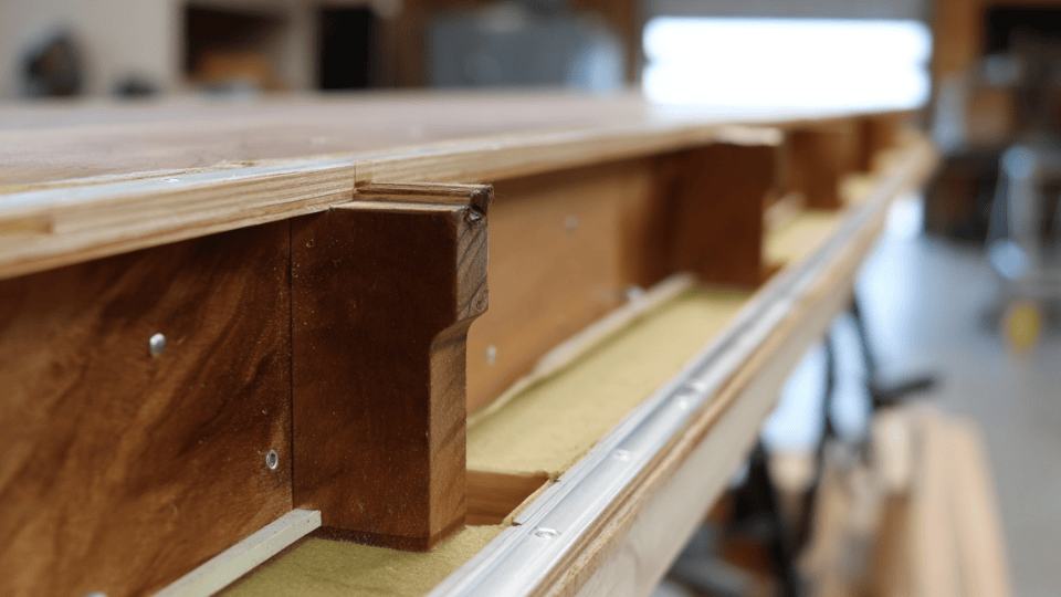 DIY bar front panels installed with clean alignment, smooth wood surface and secure fit.