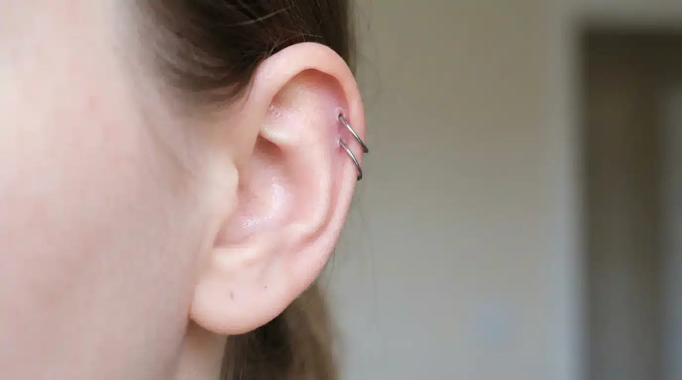 Ear with an orbital piercing