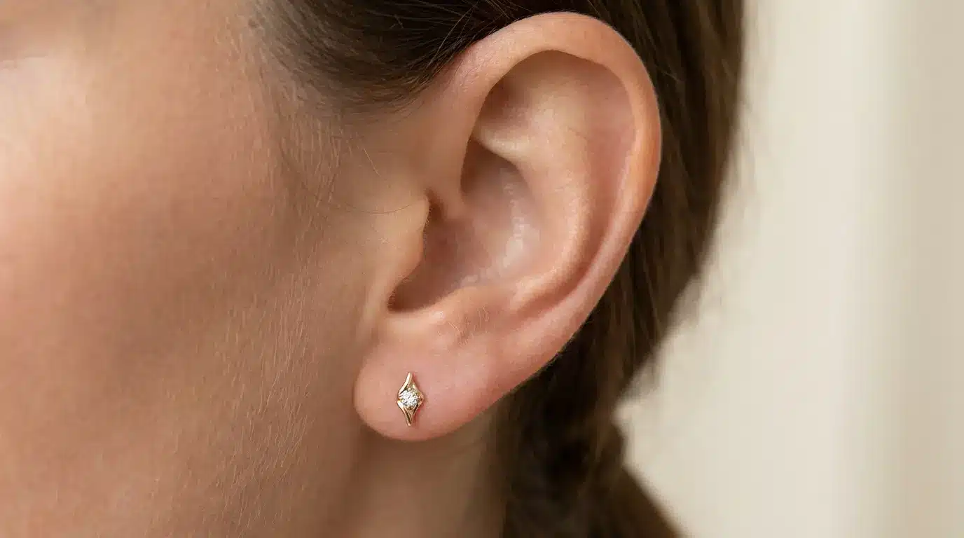 Standard lobe piercing with a simple stud earring