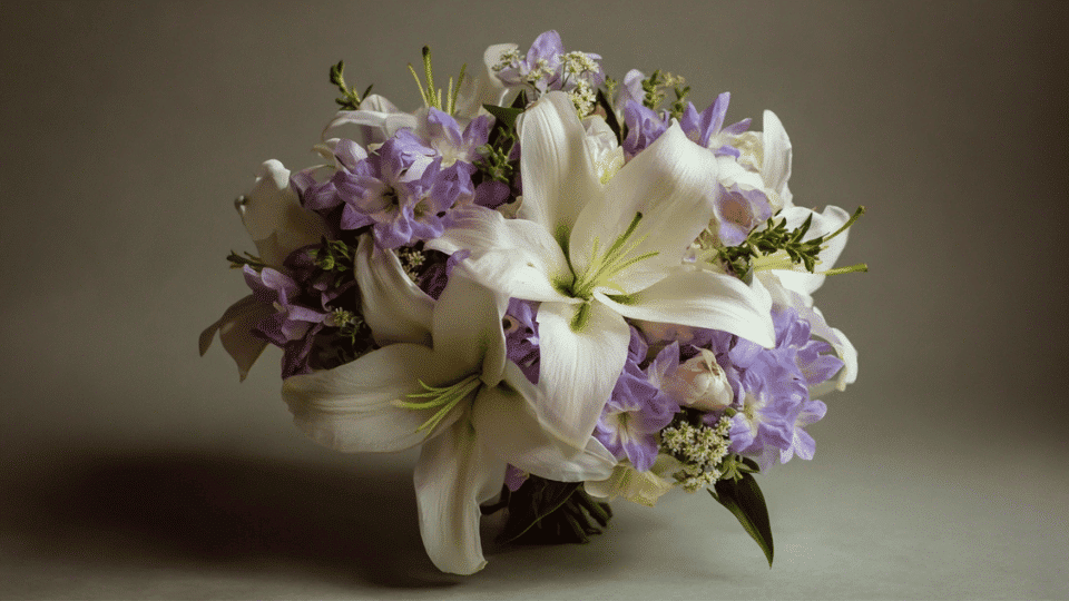 Sympathy bouquet with white and soft purple flowers in simple design