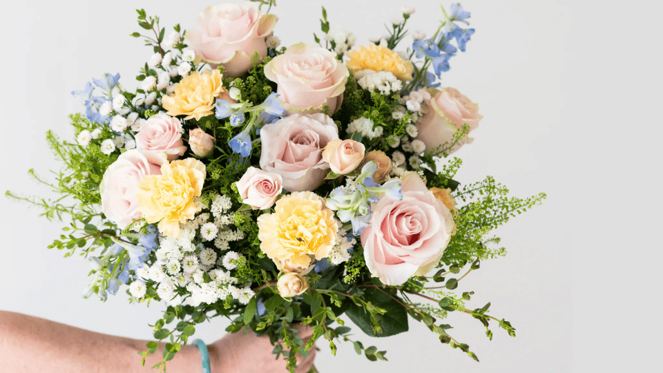 a flower bouquet by flower moxie