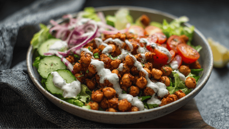 Chickpea shawarma salad with greens, veggies, and tahini dressing